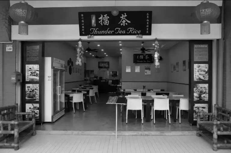 Thunder Tea Rice restaurant with open entrance and seating visible inside