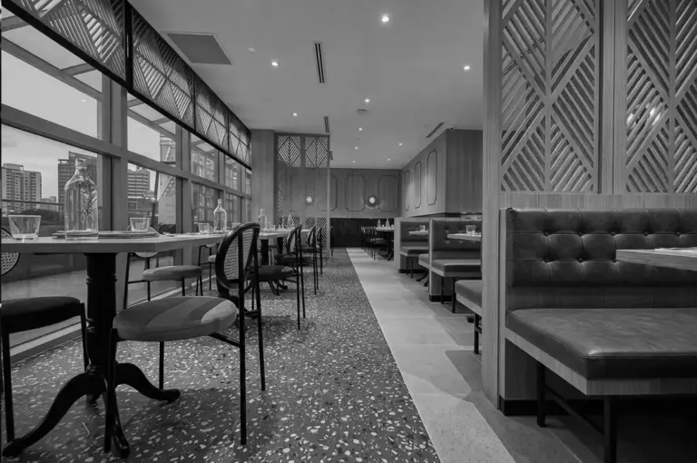 Modern restaurant with booths and wooden screens