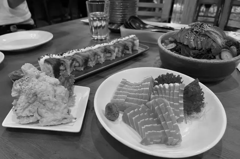 Vegetarian sushi, tofu sashimi, fried mushrooms and salad served at Lucky Cat Cafe