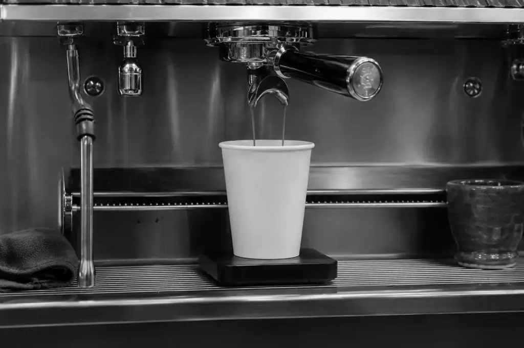 Fresh espresso shot brewing for specialty coffee
